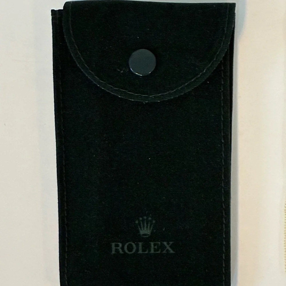 Rolex Green Watch and Jewelry Pouch